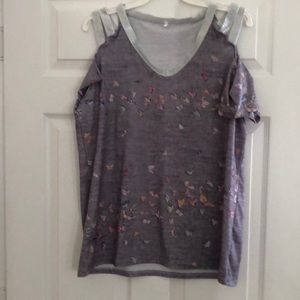 Very pretty top with 3 straps on top never worn